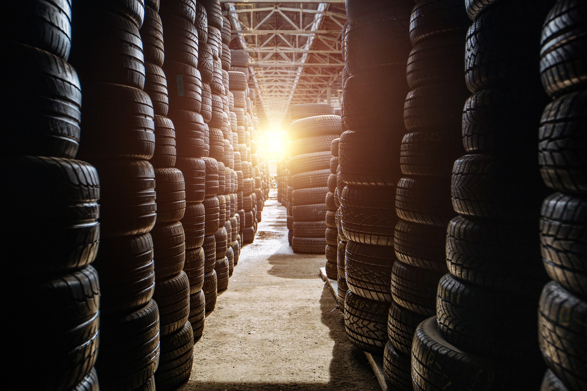 Stack of tires for sale in warehouse